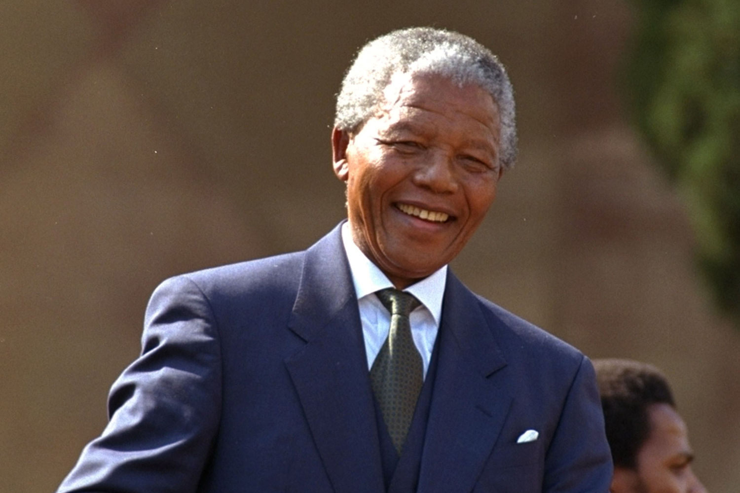 Former president Nelson Mandela does the famous 